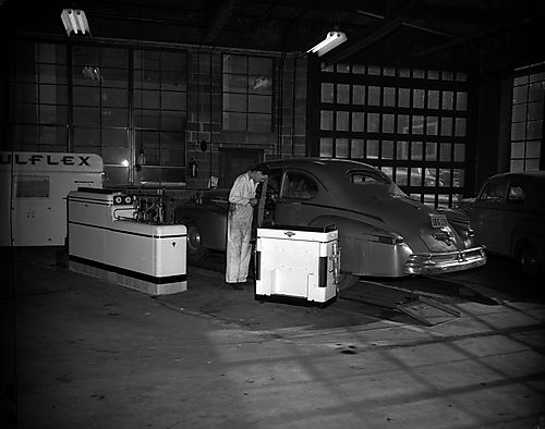 Mechanic Working on Automobile