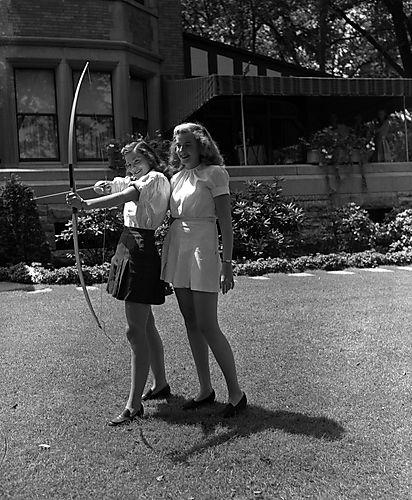 Two Girls with Bow and Arrow