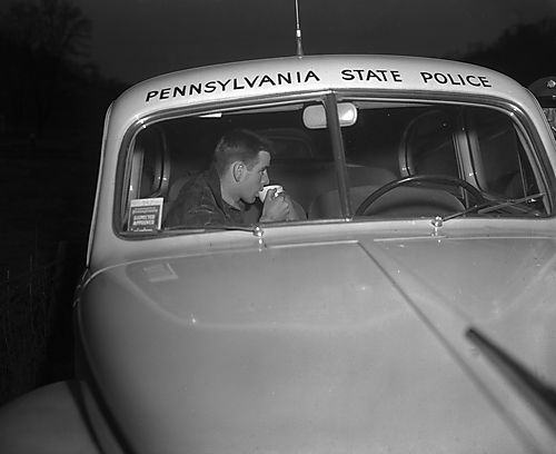 Coffee in a State Police Car