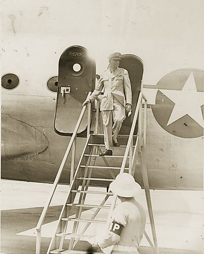 General exiting airplane