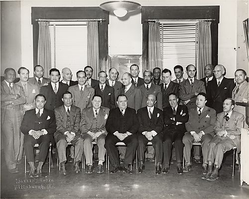 Group portrait including Bill Nunn, Sr., Sammy Malays, Gene Lewis, Hobson Lightfoot, Cornelius Jones, Royal Taylor, Charlie Richmont, Dr. Woodford Harris, Dr. Reginald Dixon, and Dr. Chester E. Harris