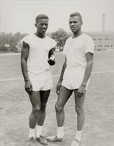 Track stars David Page, left, and Arnie Sowell, right