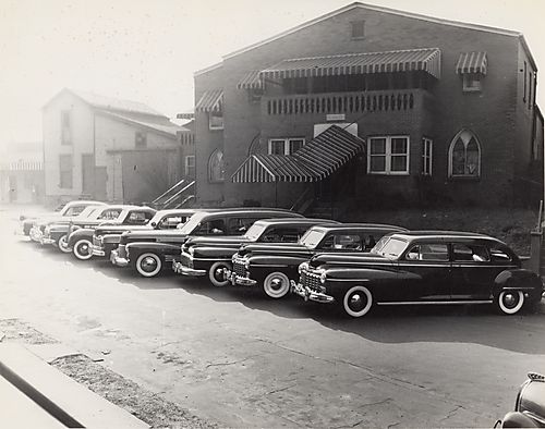 Cars parked outside Gaines Funeral Home