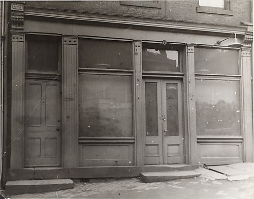 Padlocked, abandoned storefront, street no. 2334
