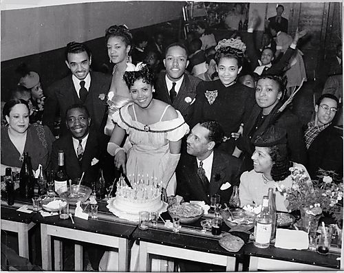 Charlene's birthday party at the Crawford Grill, with singer Boots Parker and Marion (Courier employee) attending