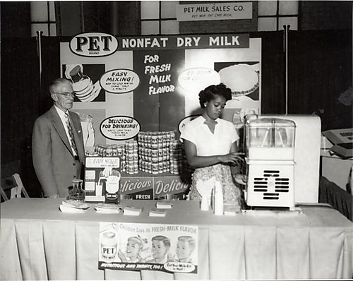 Trade show at Syria Mosque: Pet Milk promotional display