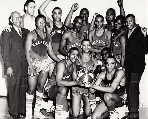 Ebenezer Baptist Church basketball team with church elder and coach