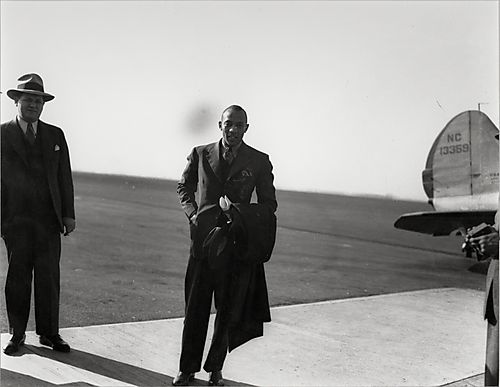 Olympic sprinter Jesse Owens arriving at Allegheny County Airport