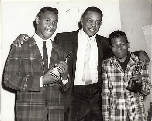 Baseball star Willie Mays awarding trophies at Kay Boys Club sports banquet