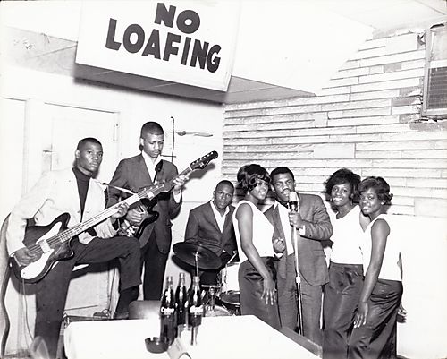 Teenage singing group including lead singer Poochie Davis at the Westray Plaza