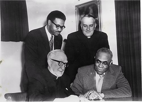 Mr. Barber, a black preacher, and two priests