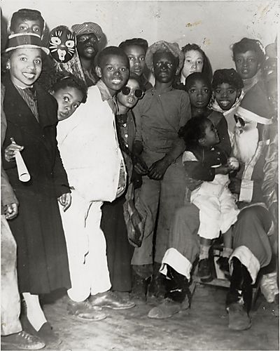 (Children with Santa Claus at right)