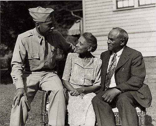 Lieutenant Jim Wiley, Tuskegee airman, with his parents