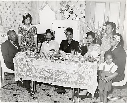 Formal family dinner in a domestic kitchen
