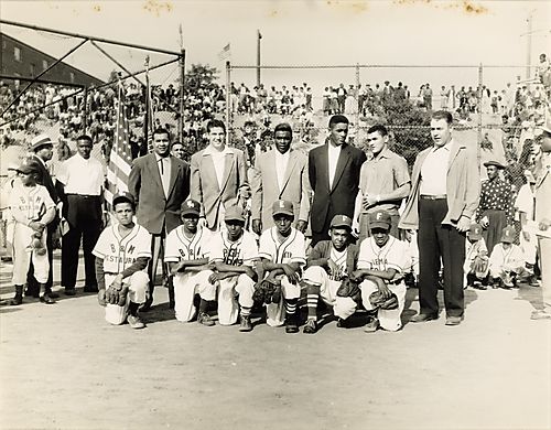 Ammon Recreational Center Little League baseball team players from B &amp; M Restaurant, Elks, Pittsburgh Lions and Firemen's ...? team, with Dodgers' players Roy Campanella, Jackie Robinson, and Joe Black, possibly on opening day of the Hill District Lit