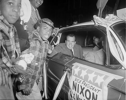 Vice President Richard Nixon campaigning in a car on Centre Avenue in the Hill District