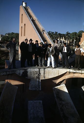 Men on Building Wall