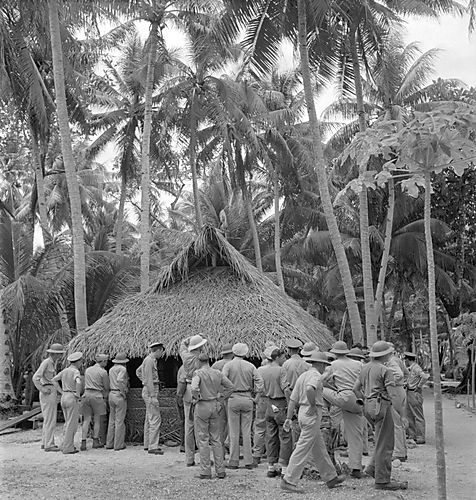 Soldiers Near Hut