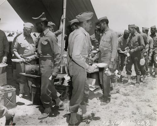 Soldiers Receiving Food in the Field