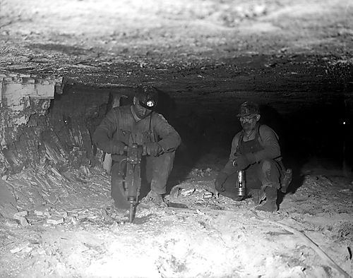 Two Men Working in a Coal Mine
