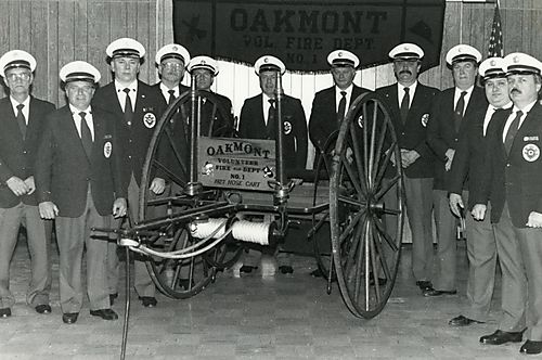 Fireman and Hose Cart