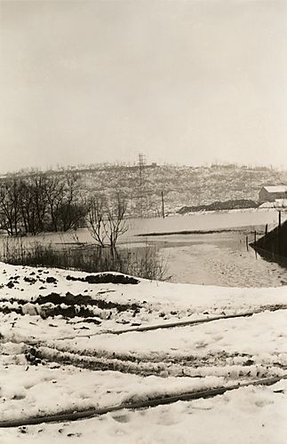 Flood and Snow by the Railroad Tracks