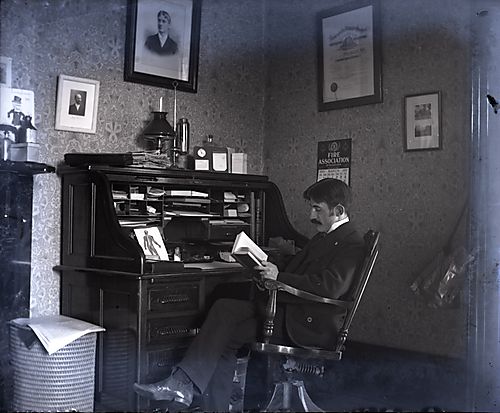 Dr. Cooper at His Desk