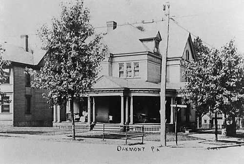 Woman Sits on Porch of Oakmont Home