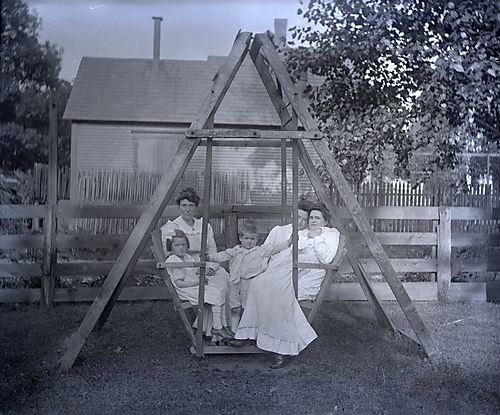 Franklin and Catharine with Mrs. Cooper on Swing