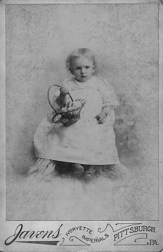 Portrait of a baby with basket