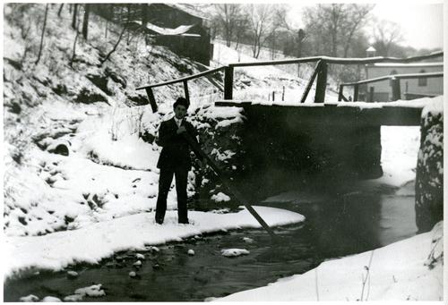 Herman Denny on Snowy Banks of Creek