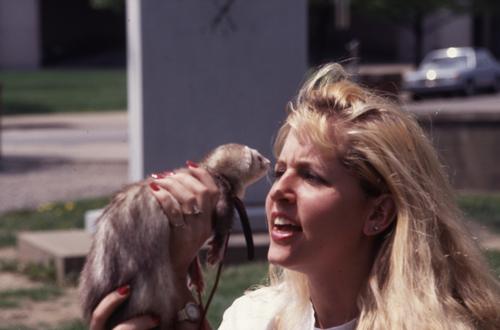 Woman with pet ferret