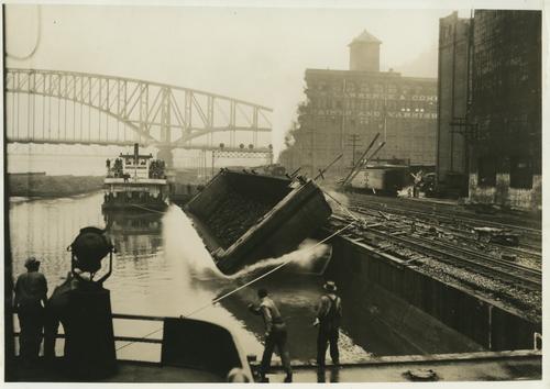 Barge being returned to the Ohio River after flood. 