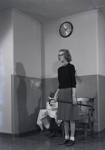 Girl with a cane at the Watson Home for Crippled Children