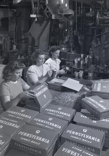 Pennsylvania Rubber Company employees packaging tennis balls