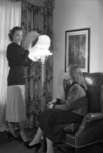 Models posing with lamps at Kaufmann's Department Store