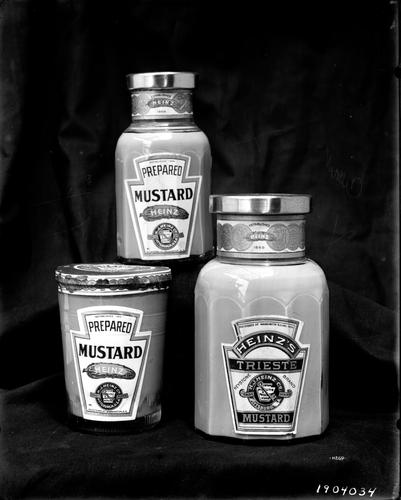 Three bottles of Heinz mustards