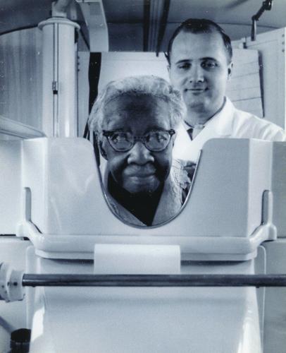 Woman receiving chest x-ray