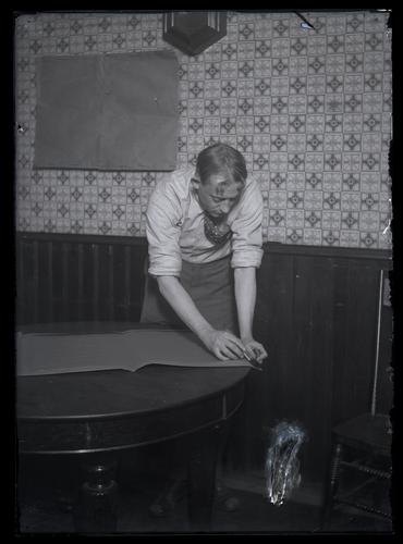 Blind Man at Work
