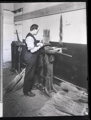 Man assembling broom