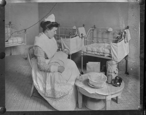Nurse Caring for Infant