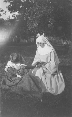 Tableau Vivant Featuring a ""Nun"" and a Lady