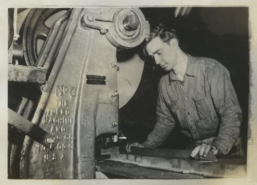 Schnabel Employees Examining Metal
