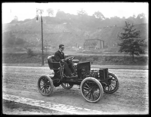 Thomas H. Guffey Driving on Fifth Avenue