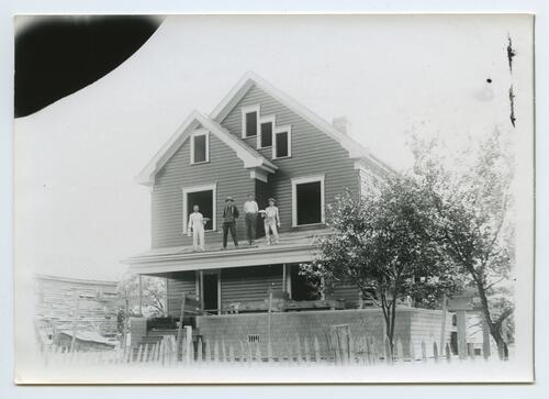 Workmen on a Roof