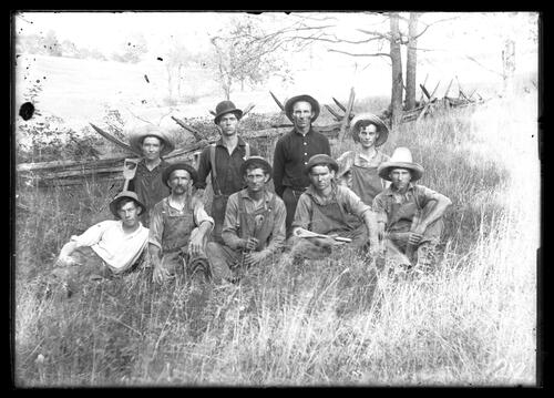 Workmen in a Field