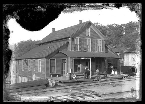 General Store Beside Railroad Tracks