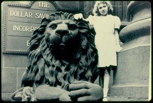 Girl with the Dollar Bank Lion