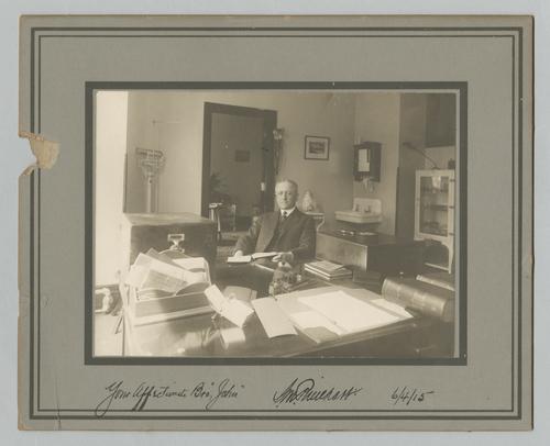 Dr. Stanley M. Rinehart in his office in Jenkins Arcade