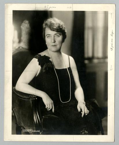 Mary Roberts Rinehart portraits in sleeveless black dress